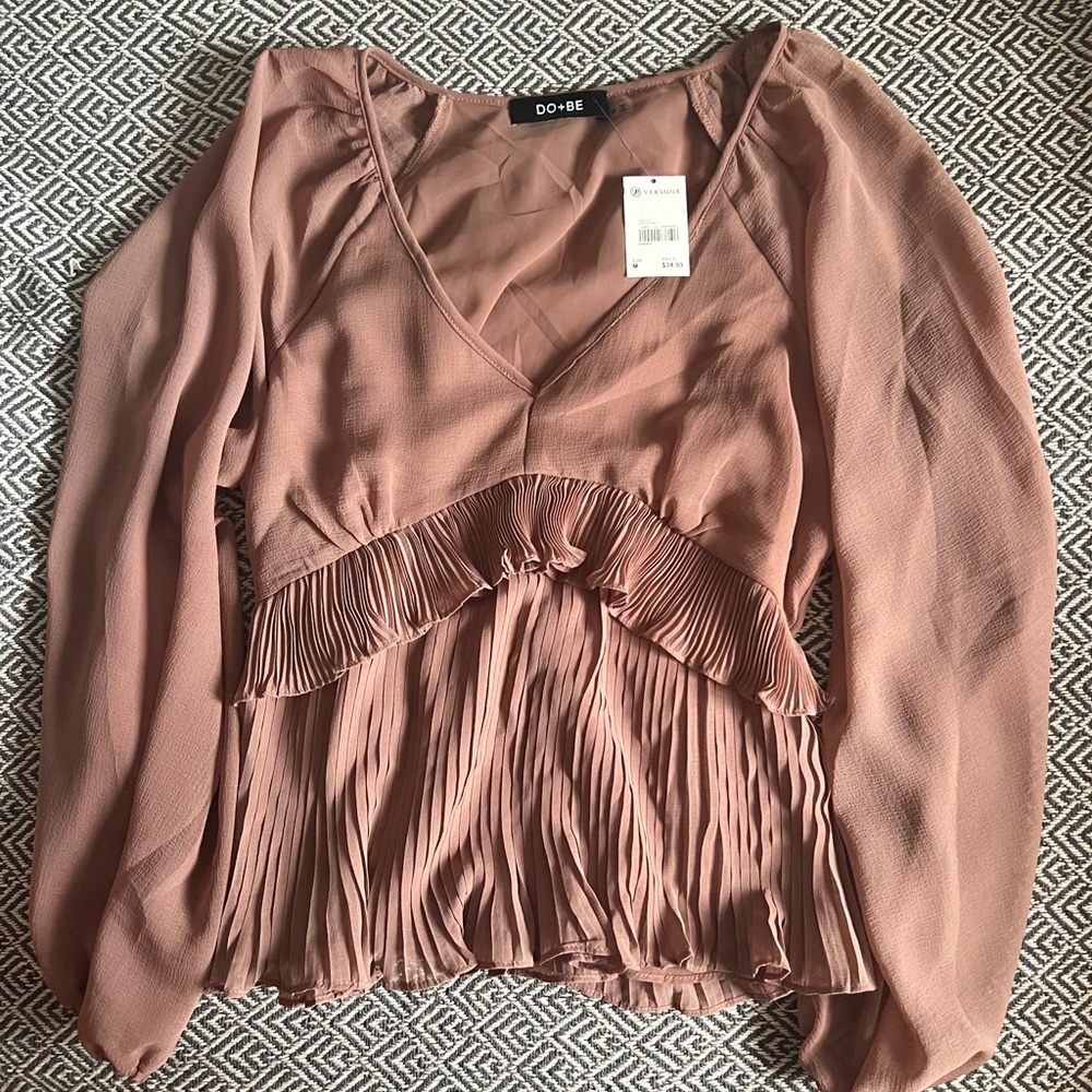 Pink Versona ruffled blouse
